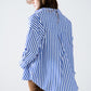 Poplin shirt with vertical stripes in blue and chest pocket