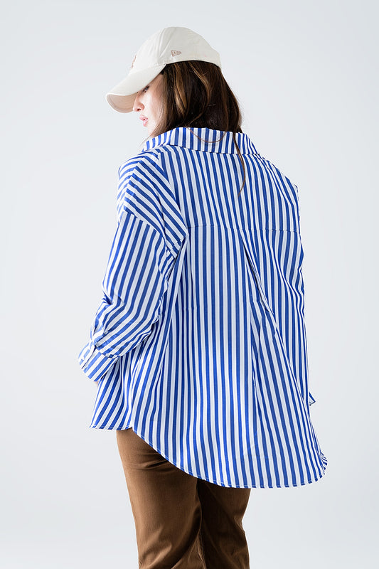 Poplin shirt with vertical stripes in blue and chest pocket