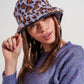 Purple bucket hat in animal print