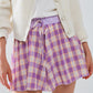 Purple Checkered print shorts with tight-fitting waist detail