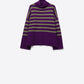 Q2 Purple oversized turtleneck sweater with green stripes and splits on the side