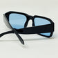 Gafas de sol rectangulares con montura negra y lentes azules