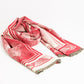 Red knitted scarf with geometric print