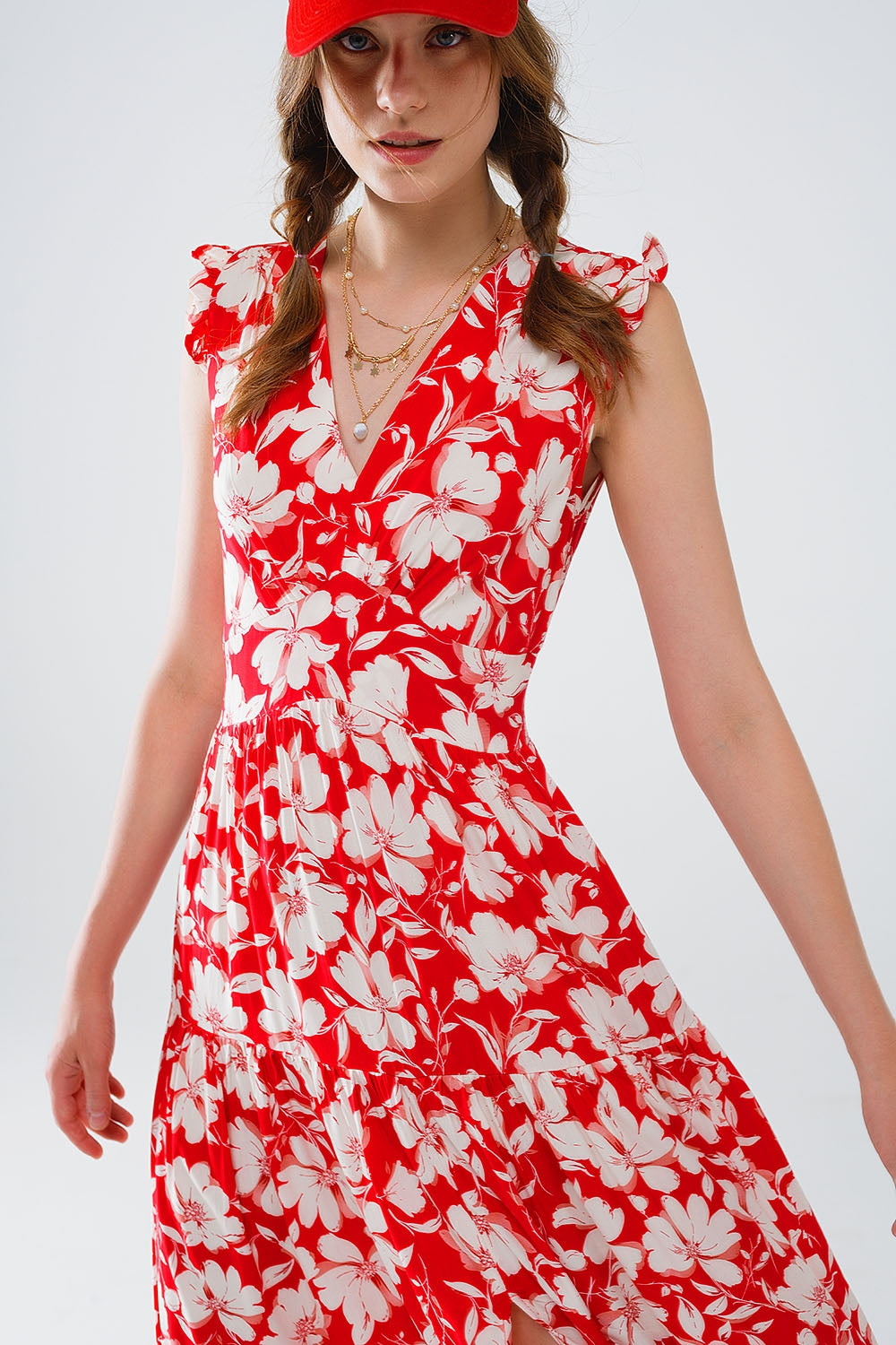 Red maxi dress with floral print and V-neck