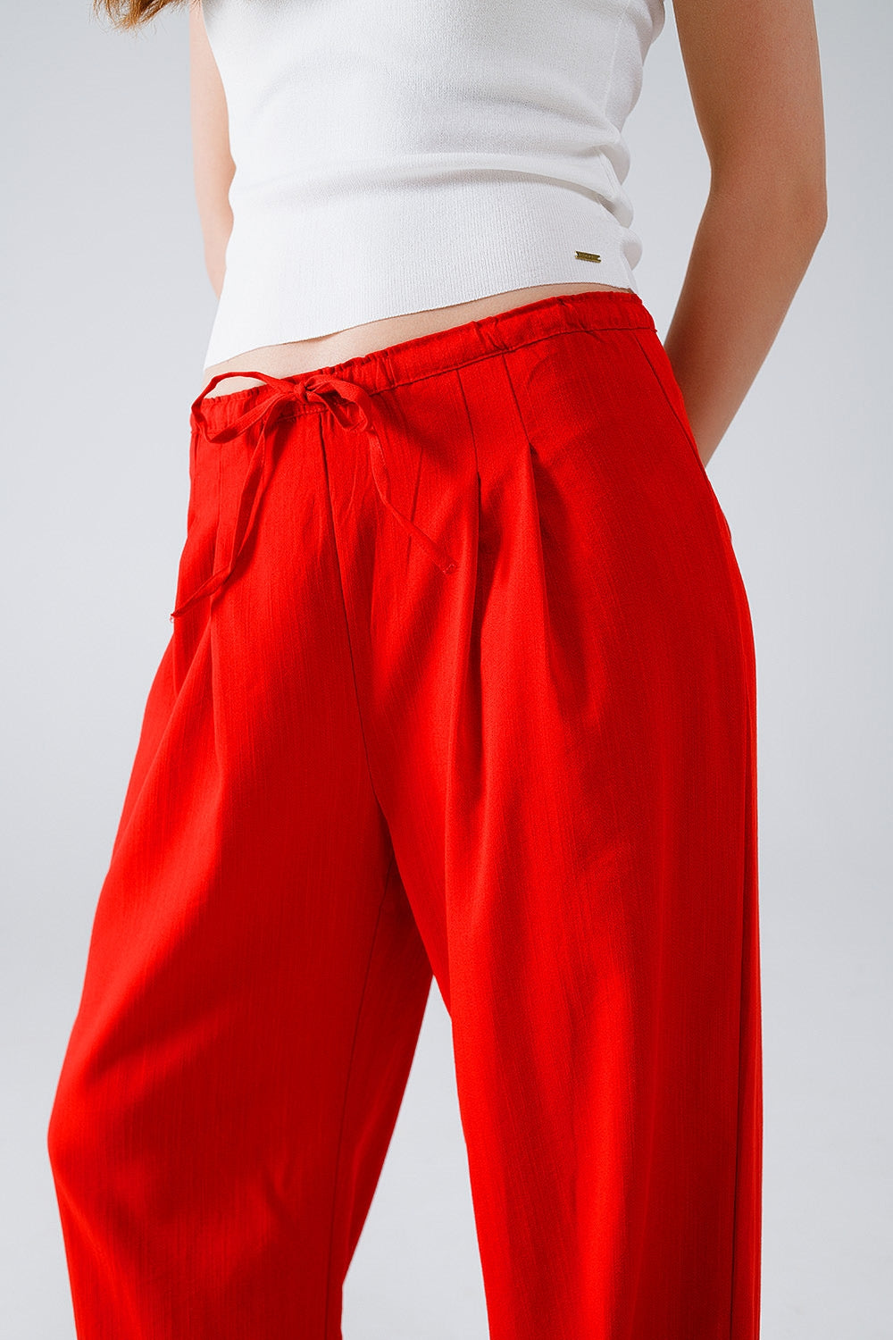 Red Relaxed Pants With Drawstring Closing And Side Pockets