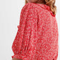 Red wrap top in clustered flower print