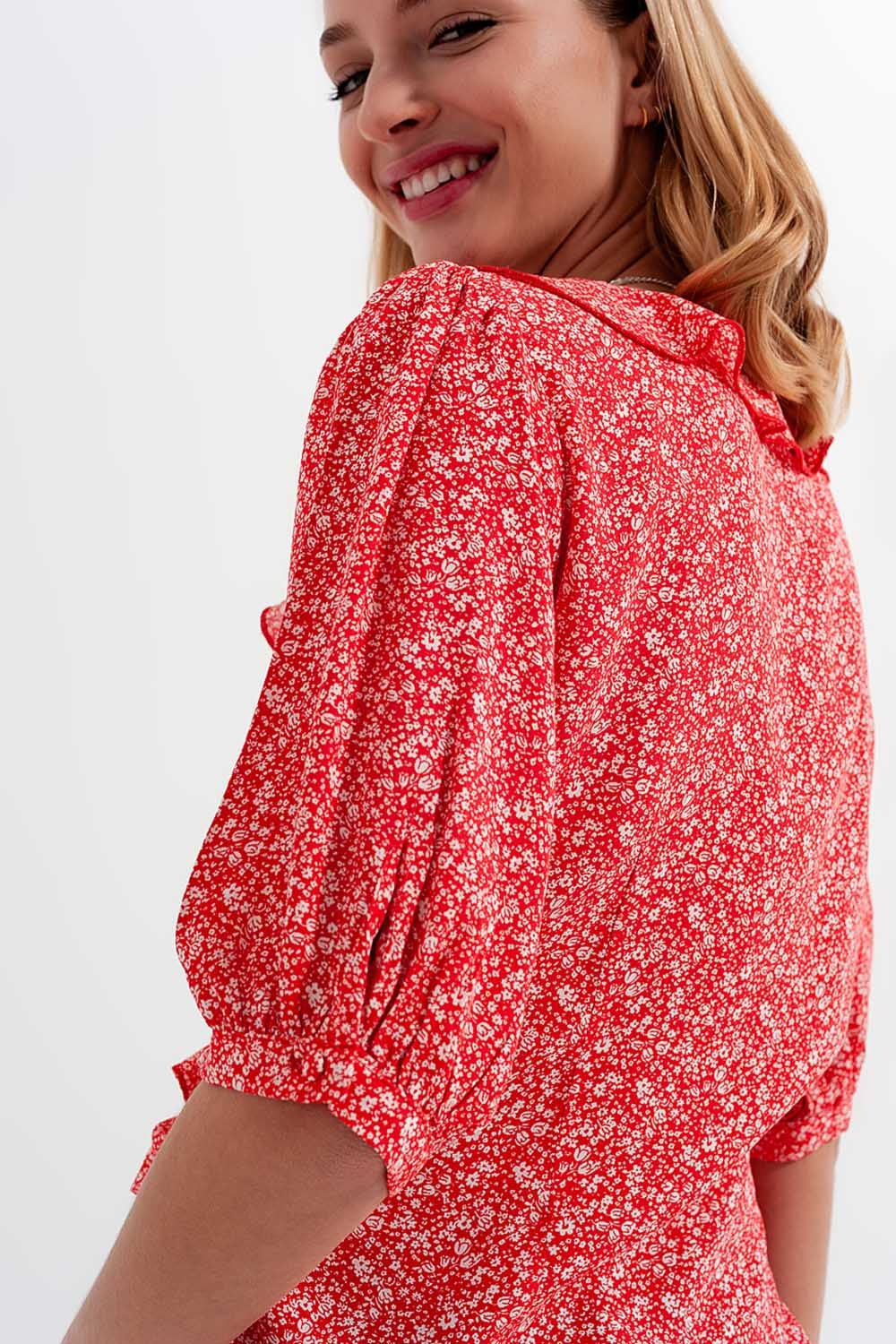 Red wrap top in clustered flower print