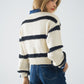 Relaxed beige jumper with black stripes