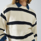 Relaxed beige jumper with black stripes