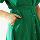 Relaxed belted mini dress with button placked down the front in green