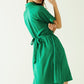 Relaxed belted mini dress with button placked down the front in green