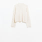 relaxed cream ribbed high neck sweater