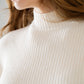 relaxed cream ribbed high neck sweater