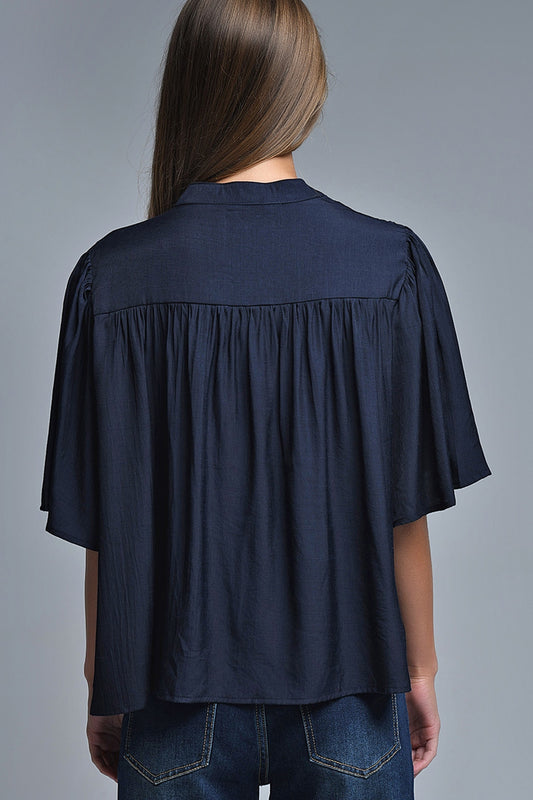 Relaxed Navy boho-style blouse with embroidered details