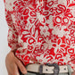 Blusa holgada con estampado floral rojo y mangas acampanadas