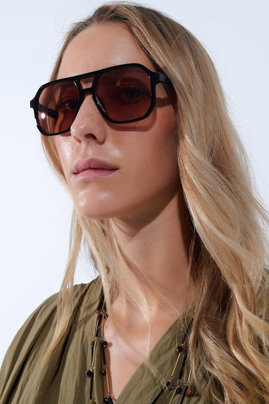 Retro style Sunglasses with black frames and orange lenses