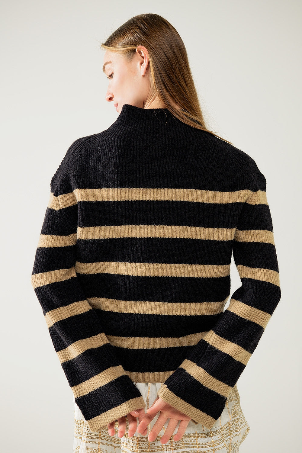 Ribbed knit jersey in black with camel stripes