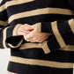 Ribbed knit jersey in black with camel stripes