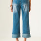 Roll hem jeans in mid blue