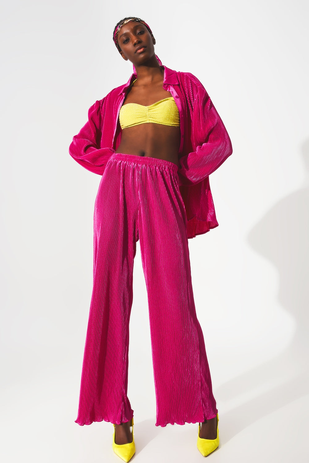 Satin pleated wide leg pants in fuchsia