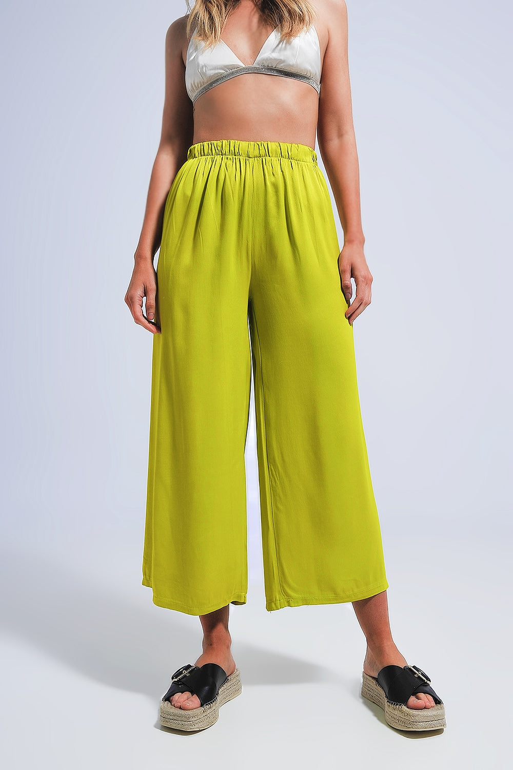 Pantalones anchos de raso en verde