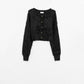 Q2 Short and fluffy black cardigan with flower buttons