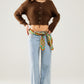 Short and fluffy brown cardigan with flower buttons