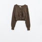 Short and fluffy brown cardigan with flower buttons