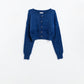 Q2 Short and fluffy navy cardigan with flower buttons