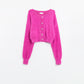 Q2 Short and fluffy pink cardigan with flower buttons