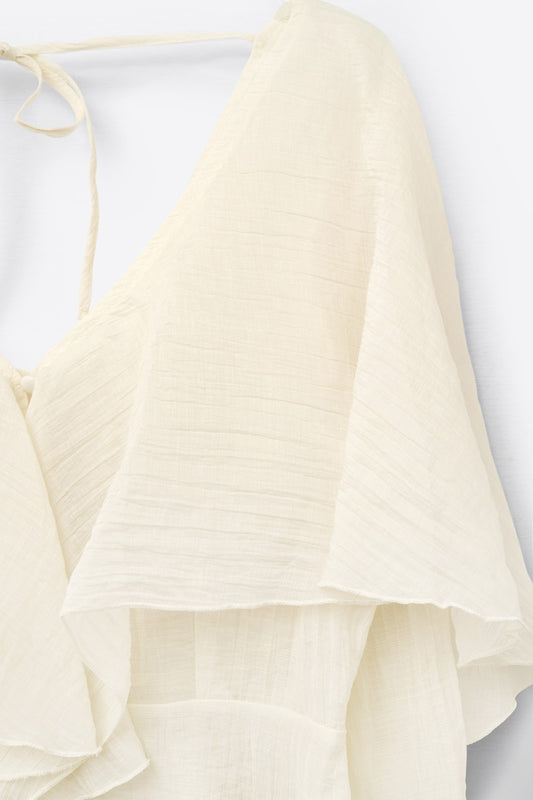 short blouse in flowing chiffon with long sleeves