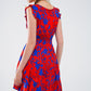 Short Dress In Red With Blue Floral Print And V-neck