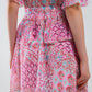 Short Dress With Abstract Print And Ruffled Skirt in Shades of Pink