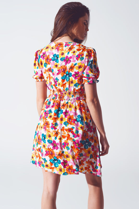 Short dress with cinched waist in multicolor floral print