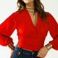 Q2 Short red crop top with long and wide sleeves