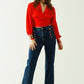 Short red crop top with long and wide sleeves