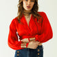 Short red crop top with long and wide sleeves