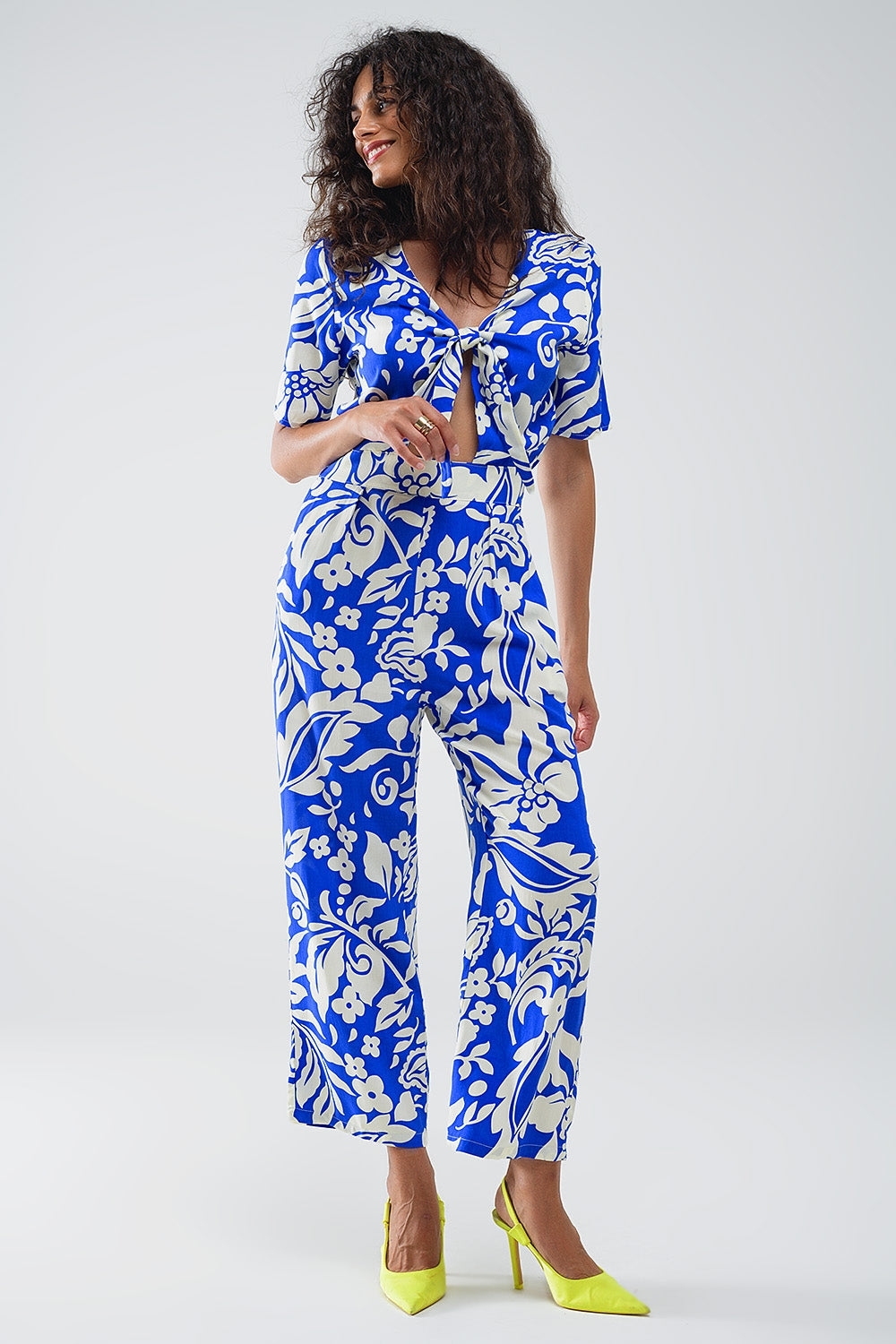 Short Sleeve Key Hole Front Floral Jumpsuit In Blue