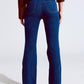 Skinny Flared Jeans In Dark Blue With Button Detail