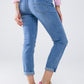 Skinny Jeans In light wash with detail on the pocket