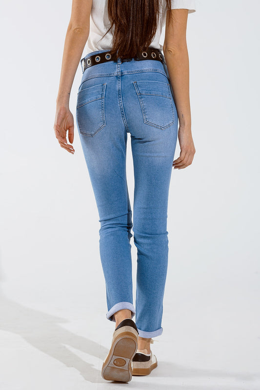 Skinny jeans in washed blue with strass all over the front