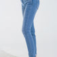 Skinny jeans in washed blue with strass all over the front