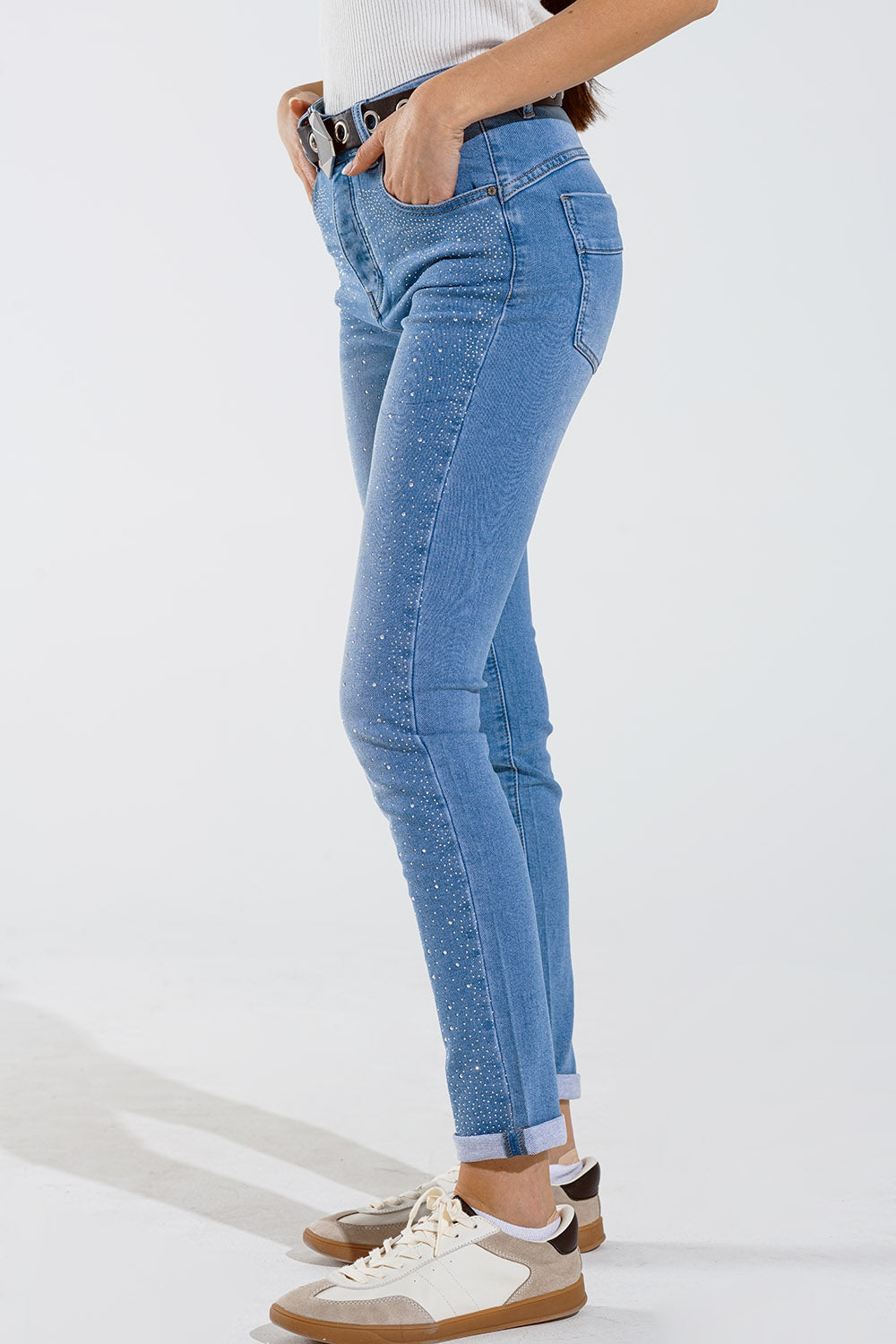 Skinny jeans in washed blue with strass all over the front