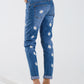 Skinny Jeans With Printed White Daisys In Mid Wash