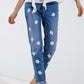 Skinny Jeans With Printed White Daisys In Mid Wash