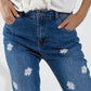 Skinny Jeans With Printed White Daisys In Mid Wash