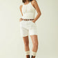 Sleeveless White Top With Ribbed Details