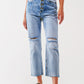 Q2 Sraight-leg jeans with exposed buttons and ripped knees in light wash