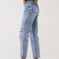 Sraight-leg jeans with exposed buttons and ripped knees in light wash