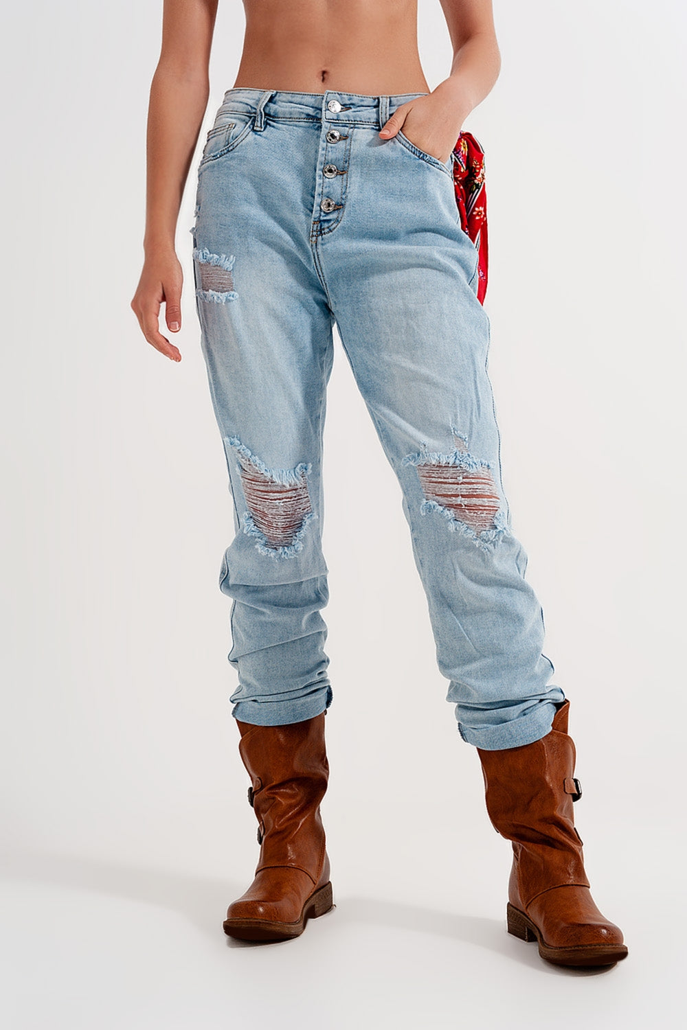 Straight leg distressed jeans with button detail in light blue